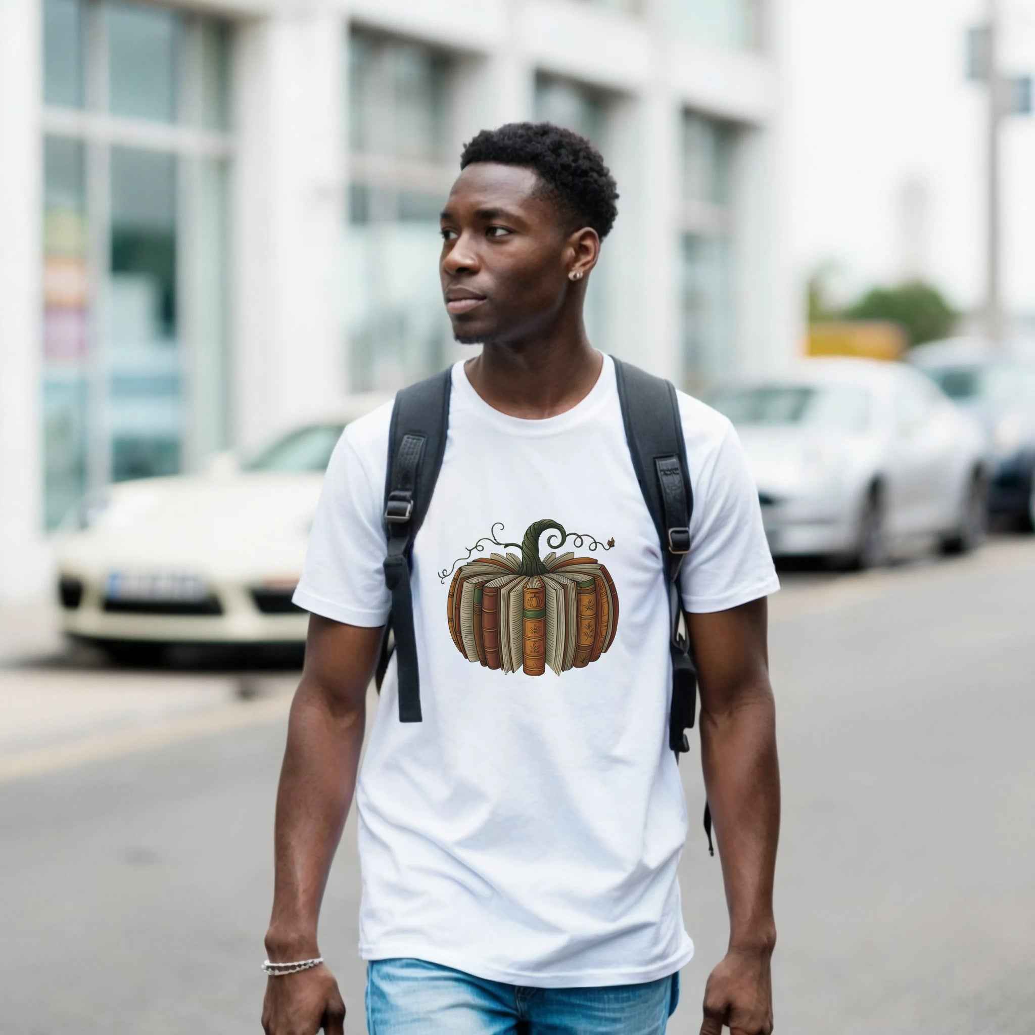 Bookish Pumpkin Halloween T-Shirt – Literary Fall Vibes & Cozy Comfort in Your Choice of Colors